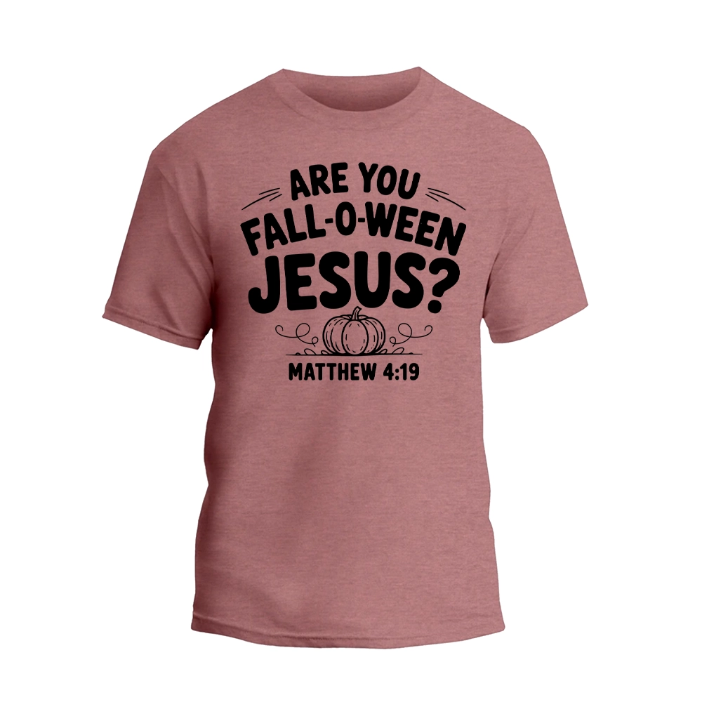 A pink t-shirt with a graphic design featuring the text "ARE YOU FALL-O-WEEN JESUS?" along with a pumpkin and the text "MATTHEW 4:19" below it.
