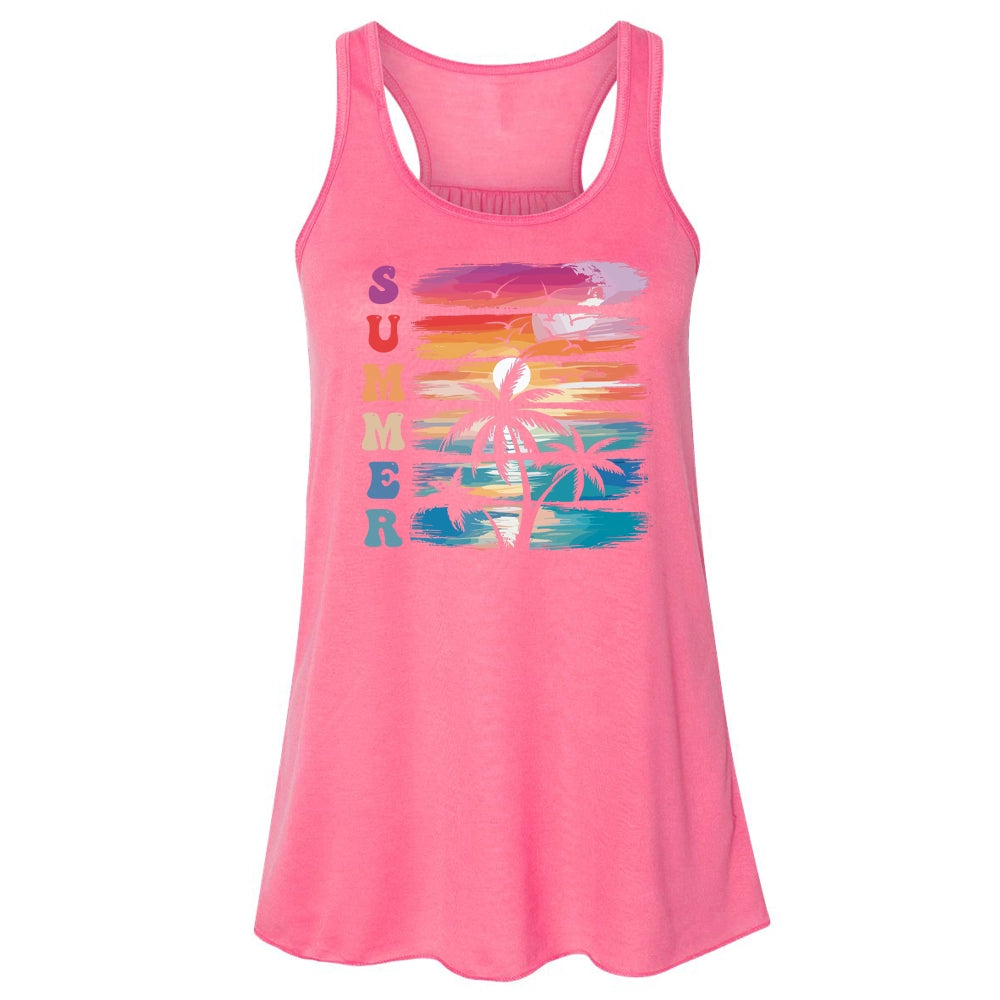 A pink tank top with a graphic design featuring a palm tree and a rainbow.