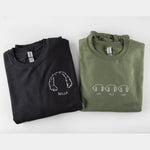 a couple of shirts that are sitting on a table