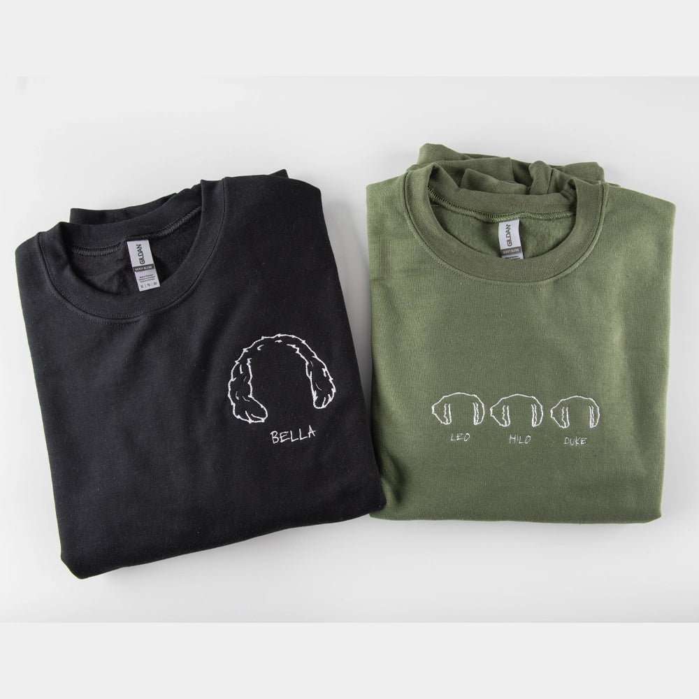 a couple of shirts that are sitting on a table