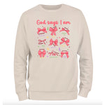 a white sweatshirt with pink bows on it