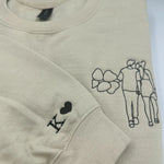 a t - shirt with a picture of a man and a woman on it