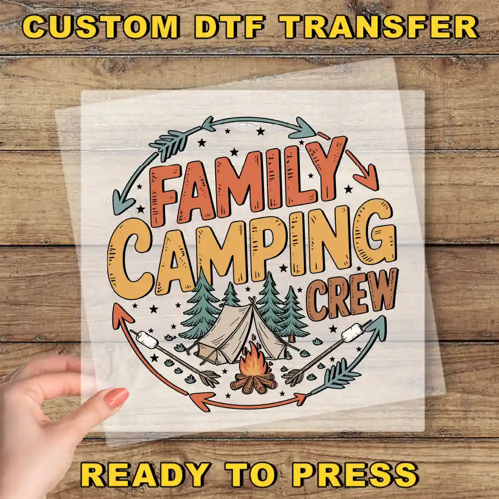 a hand holding a paper with the words family camping crew on it