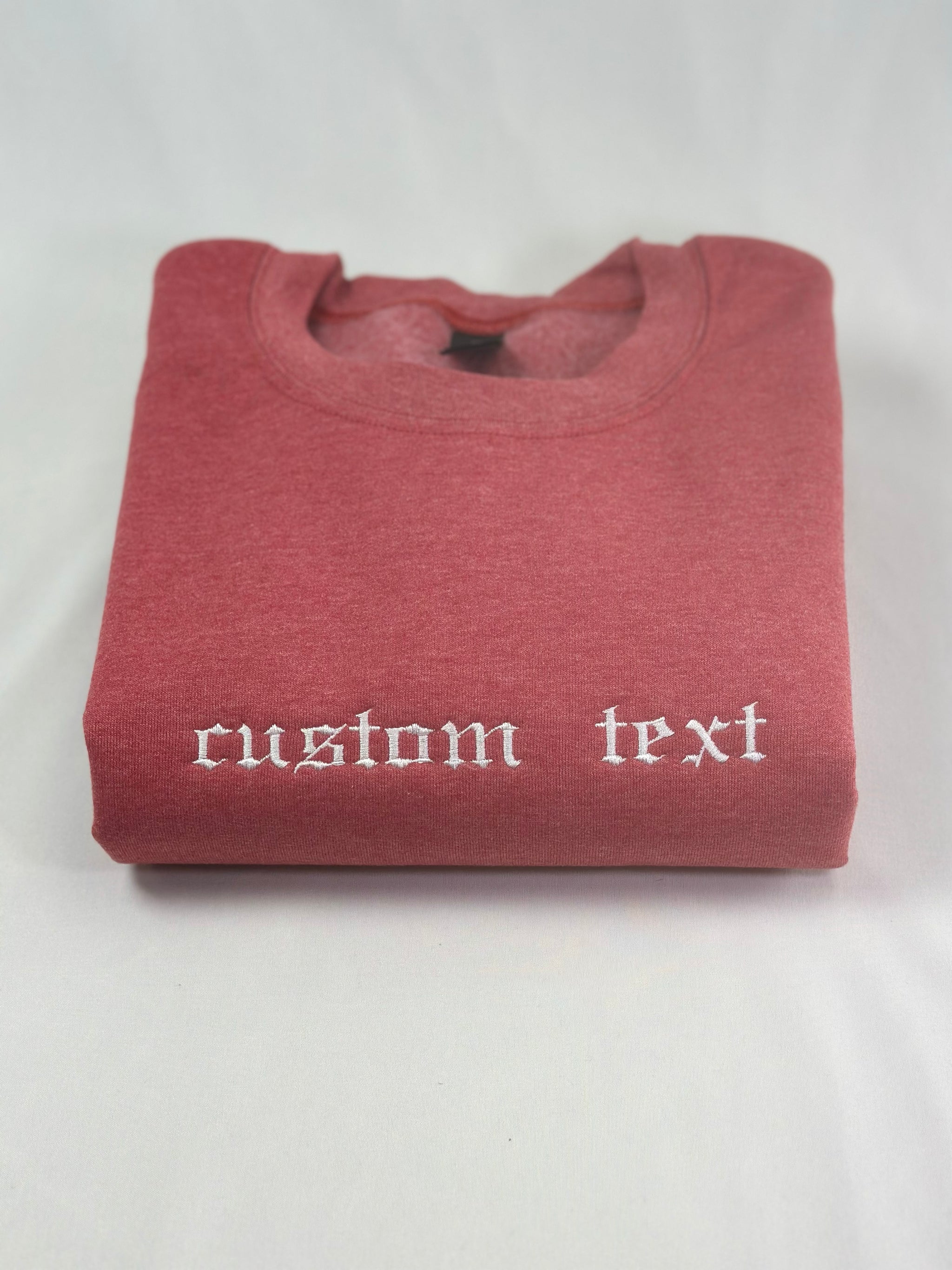 a red t - shirt with a white wording on it