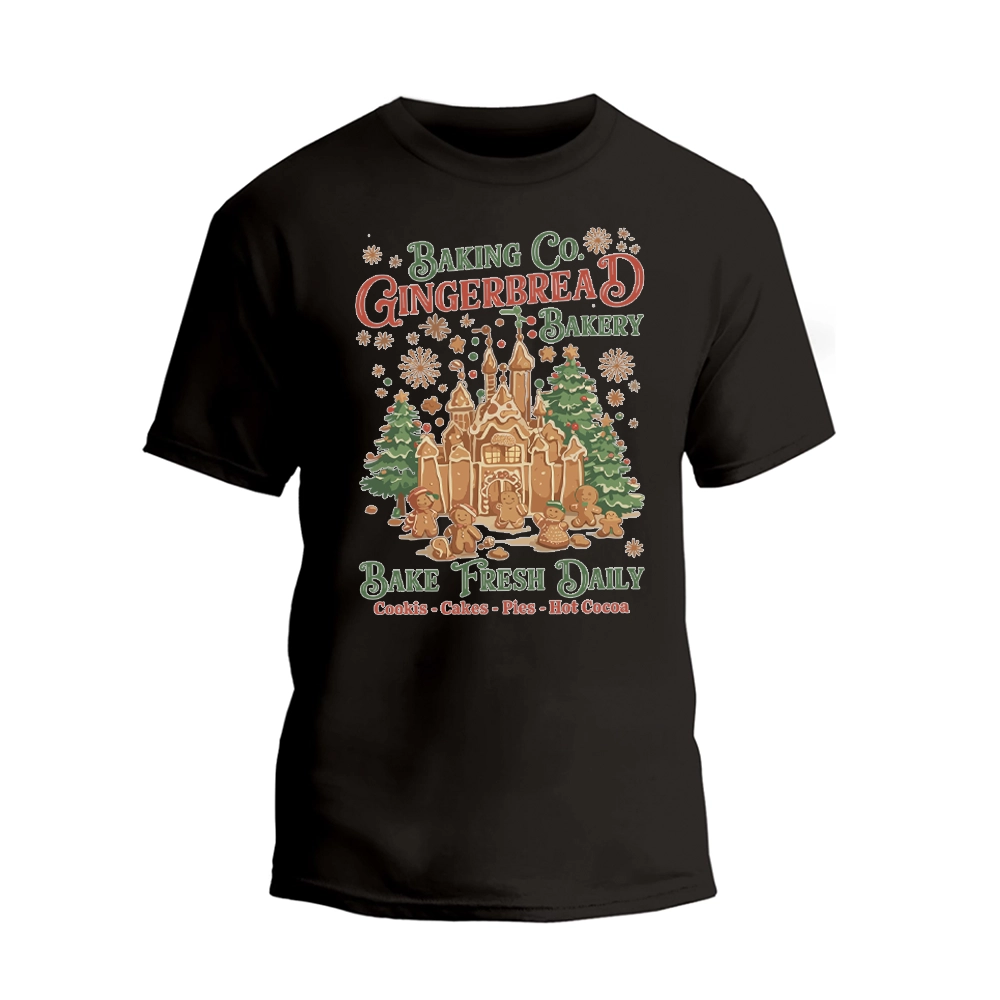 A black t-shirt with a graphic design featuring a gingerbread house and snowflakes, along with text promoting a bakery.