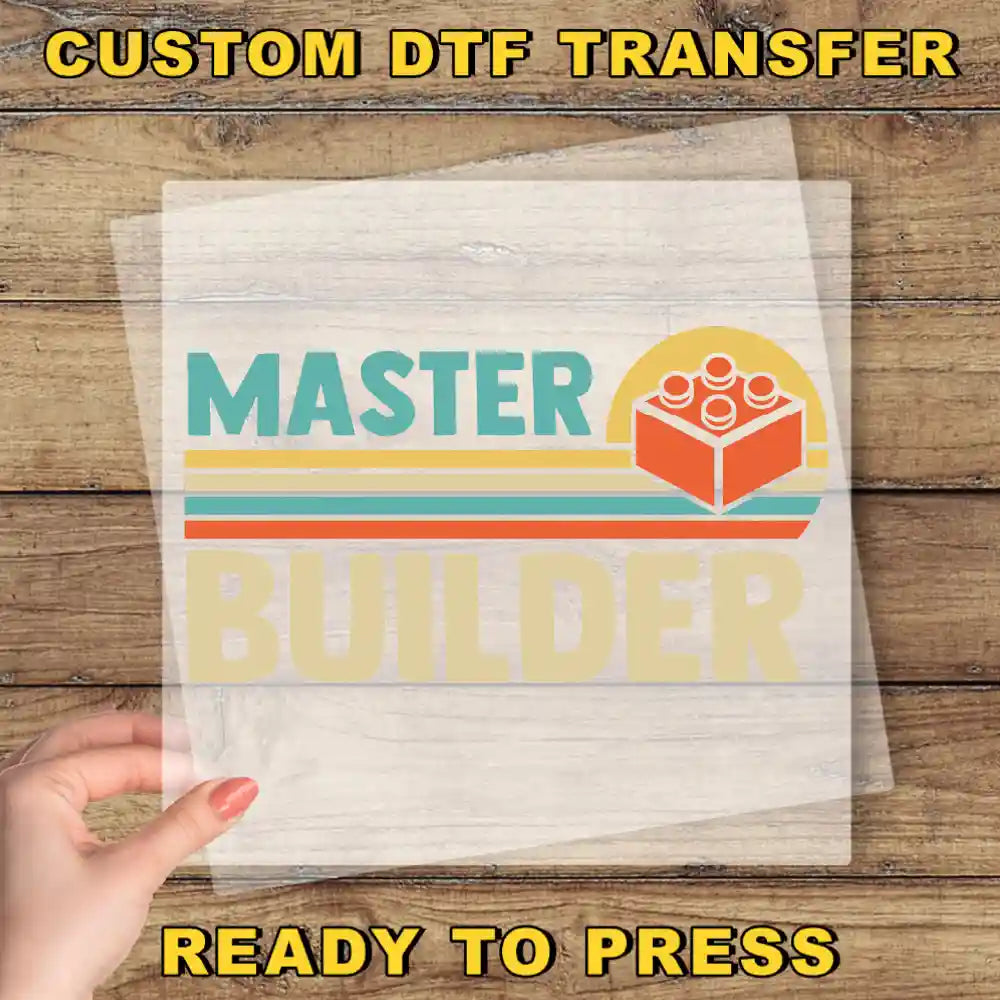 a person holding a piece of paper with the words master builder on it