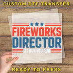 a hand holding a piece of paper with the words fire works director on it