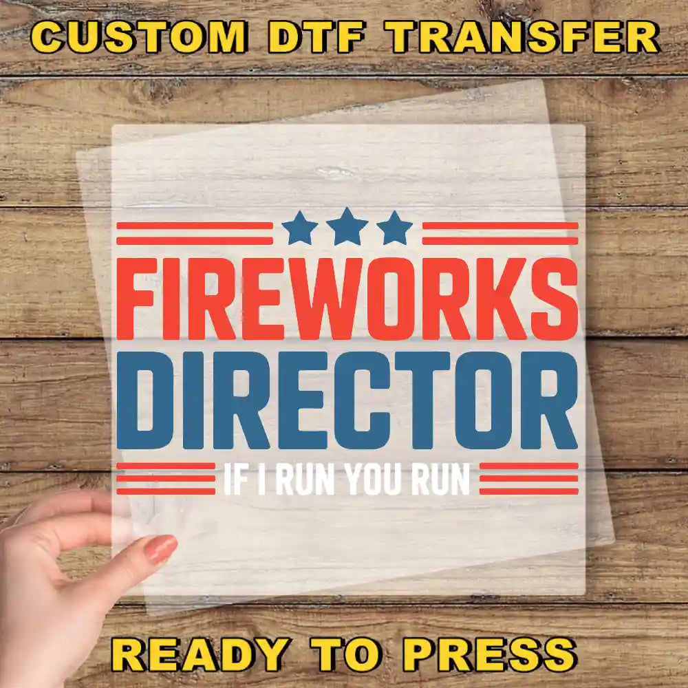 a hand holding a piece of paper with the words fire works director on it