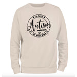 a white sweatshirt with the words autism on it