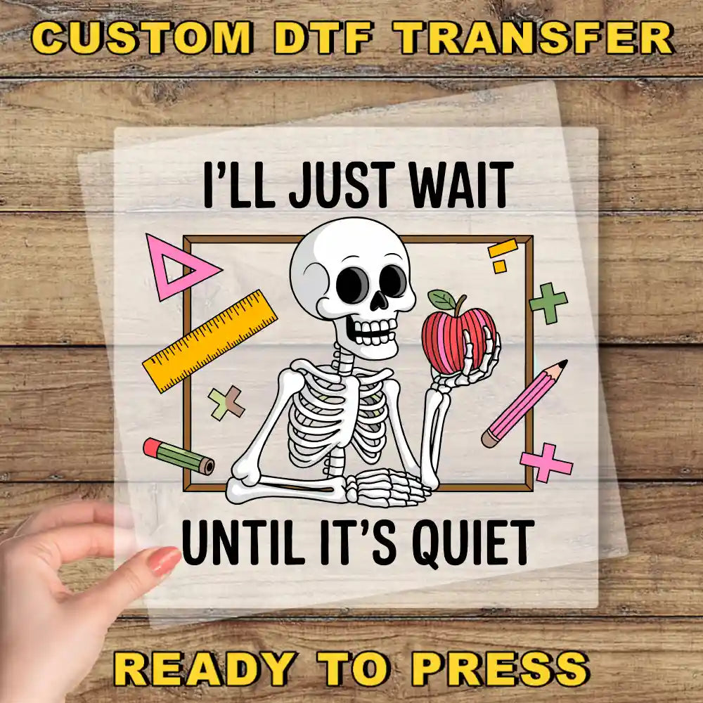 a person holding a piece of paper with a skeleton on it