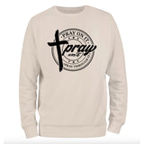 a white sweatshirt with the words pray on it