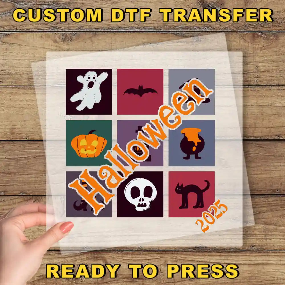 a hand holding a piece of paper with halloween images on it