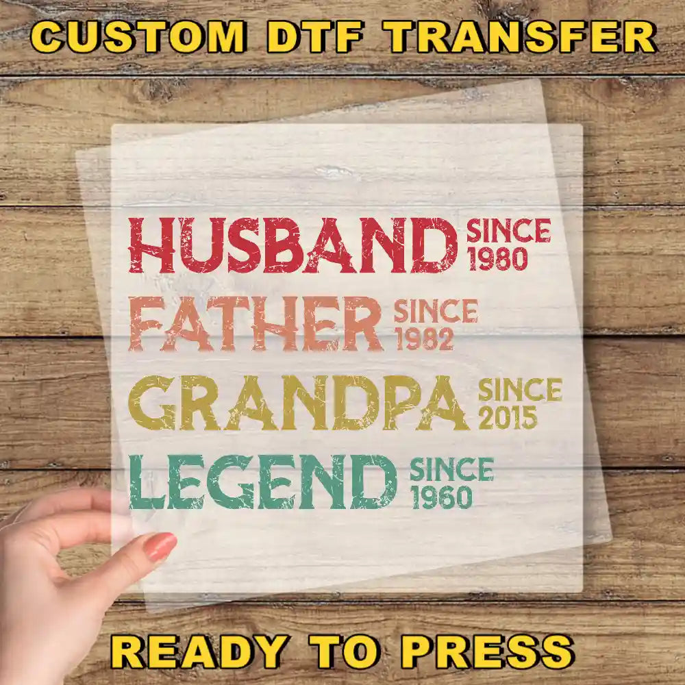 a hand holding up a piece of paper with the words, husband, father,