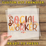 a person holding a piece of paper with the words social worker on it