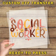 a person holding a piece of paper with the words social worker on it