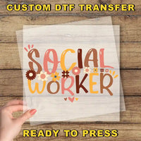 a person holding a piece of paper with the words social worker on it