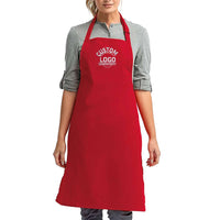 a woman wearing a red apron with a logo on it