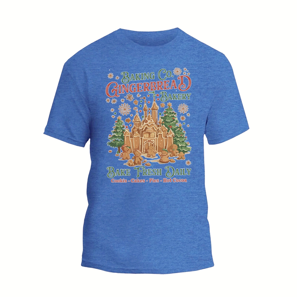 A blue t-shirt with a graphic design depicting a gingerbread house and snowflakes, along with text promoting a bakery.