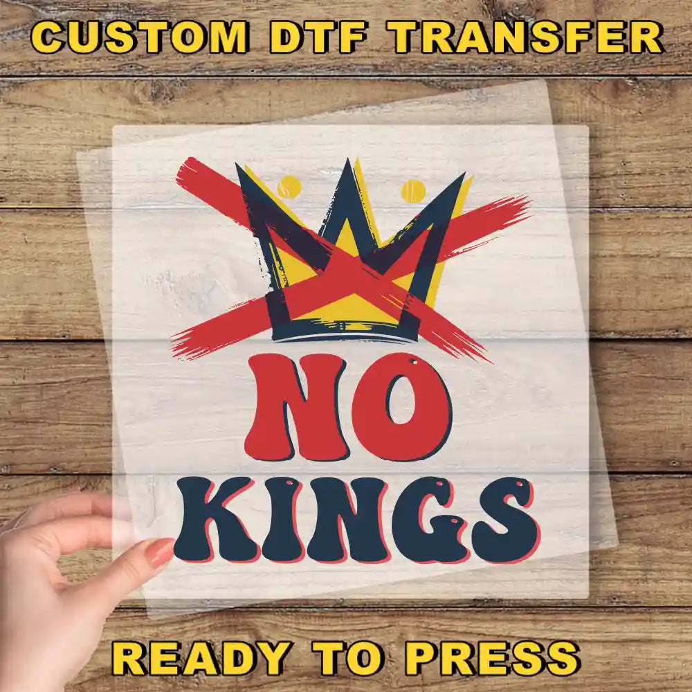 a hand holding a piece of paper that says no kings ready to press