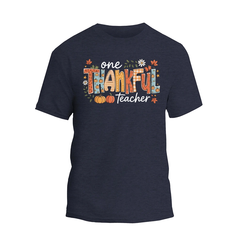 A dark blue t-shirt with a colorful graphic design that says "One Thankful Teacher" in a stylized font.