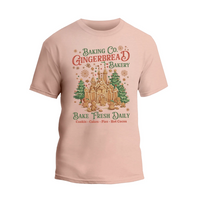 A t-shirt design featuring a gingerbread house and text promoting a bakery.