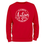 a red sweatshirt with the words autism on it