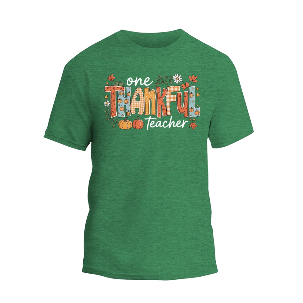 A green t-shirt with a colorful graphic design that says "One Thankful Teacher" in a stylized font.