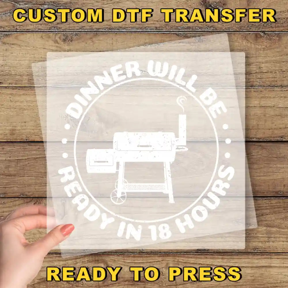 a person holding a piece of paper with a machine on it