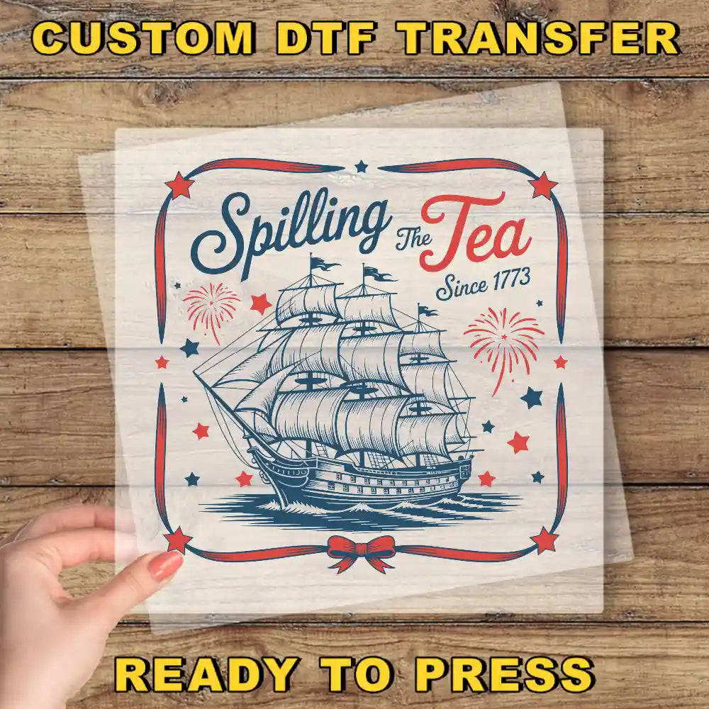 a person holding up a piece of paper with a ship on it