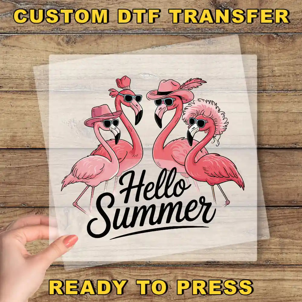 a person holding a piece of paper with flamingos on it