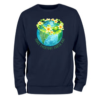 a sweatshirt with the earth and flowers on it