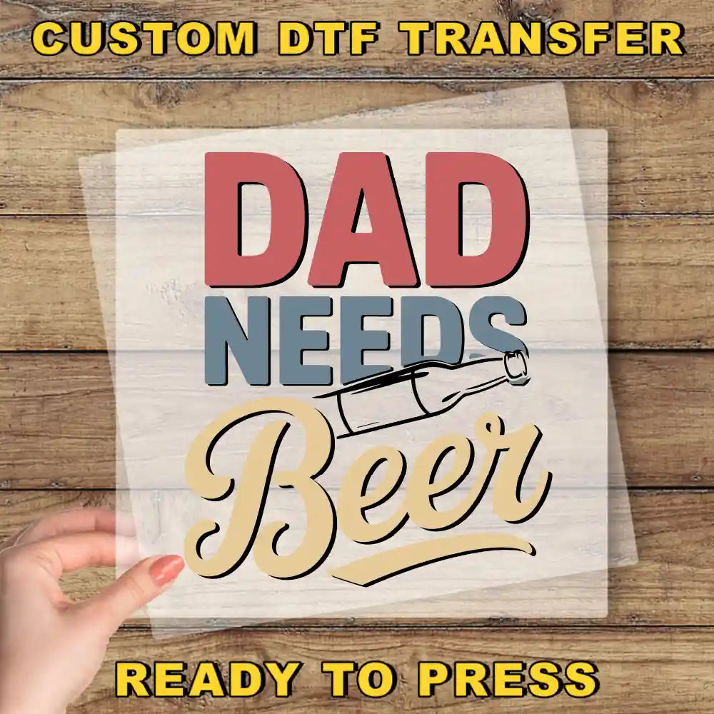 a person holding a piece of paper with the words dad needs beer