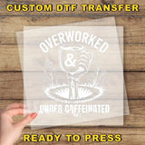 a person holding a piece of paper with the words overworked and under -