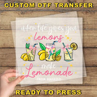 a hand holding a piece of paper with the words, custom diy transferer