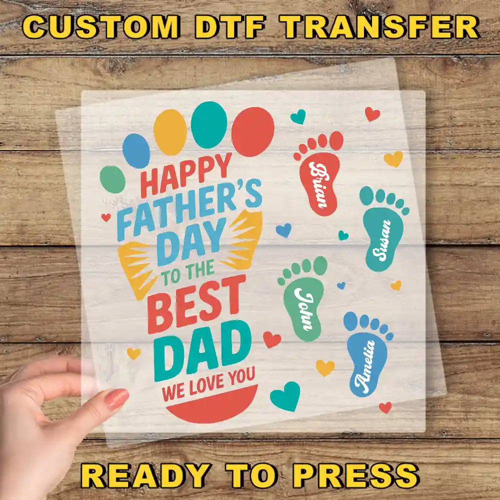 a hand holding a piece of paper with a picture of a father's day