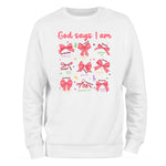 a white sweatshirt with red bows on it