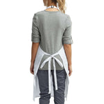 a woman wearing a grey top with a white tie around the waist