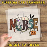 The image is a hand holding a piece of paper with the word "NURSE" written on it, along with various Halloween-themed elements such as a spider web, a bat, a pumpkin, and a skeleton.