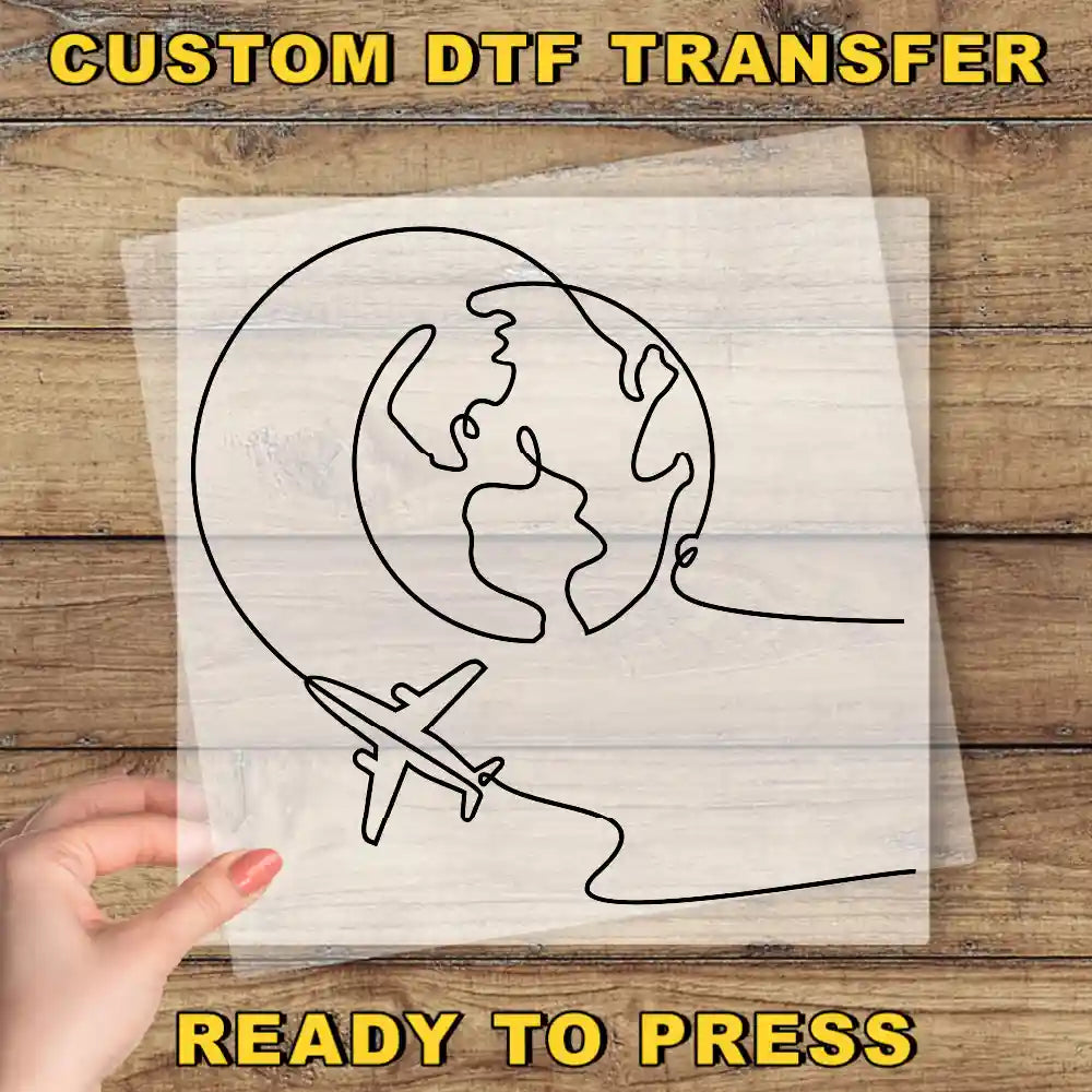 a hand holding a piece of paper with a drawing of a plane flying around the