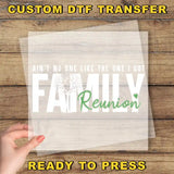 a person holding a piece of paper with the words family reunion printed on it