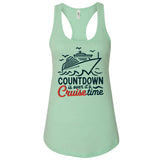 A mint green tank top with a graphic design depicting a cruise ship and the text "COUNTDOWN is over it's Cruise time" printed on it.