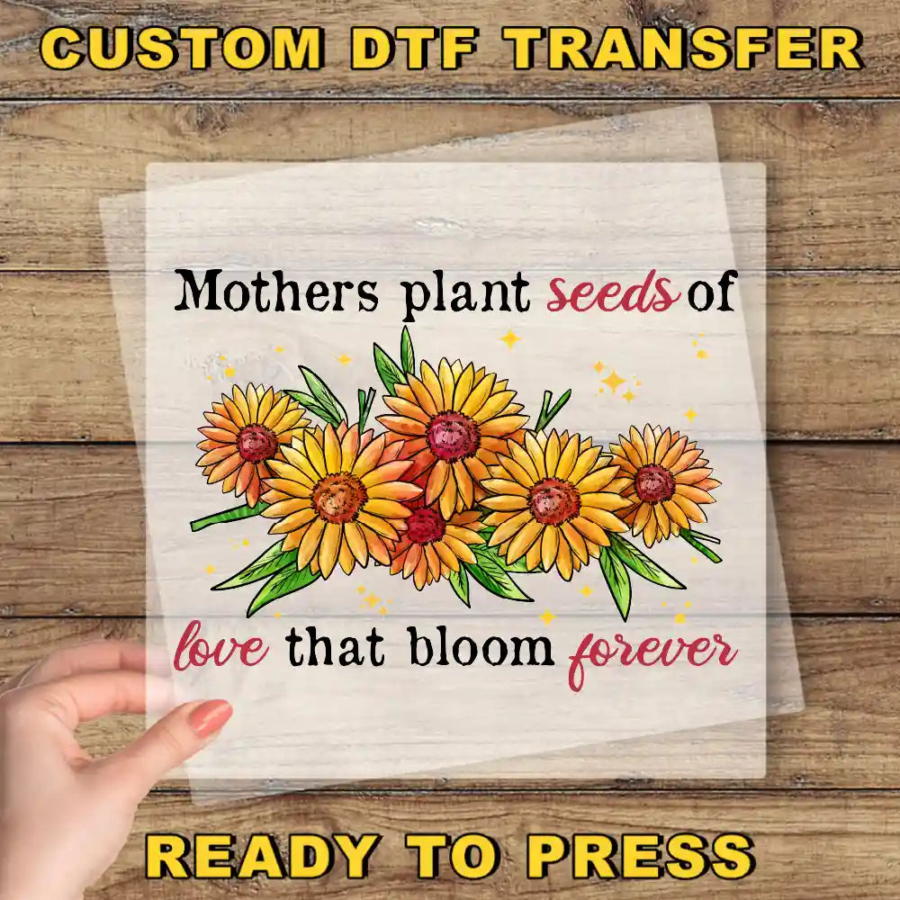 a hand holding a piece of paper with flowers on it