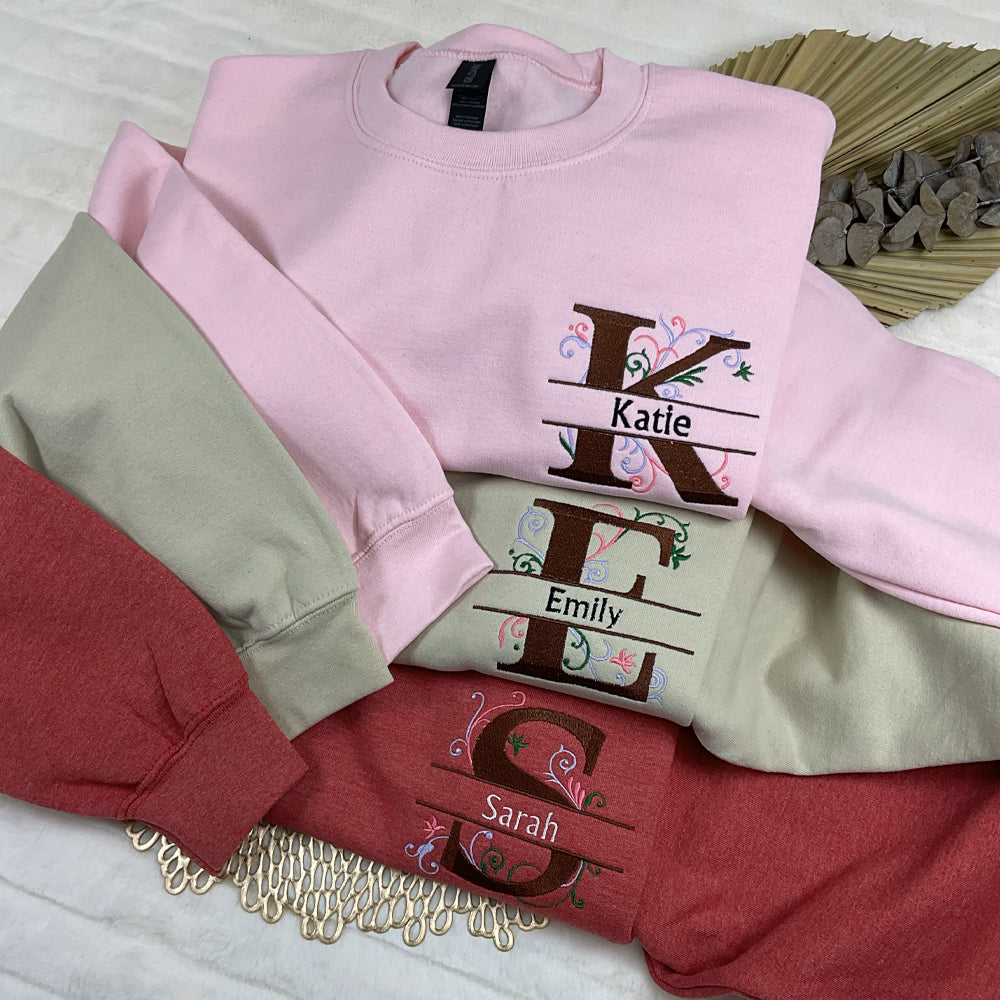 a pile of clothing sitting on top of a bed