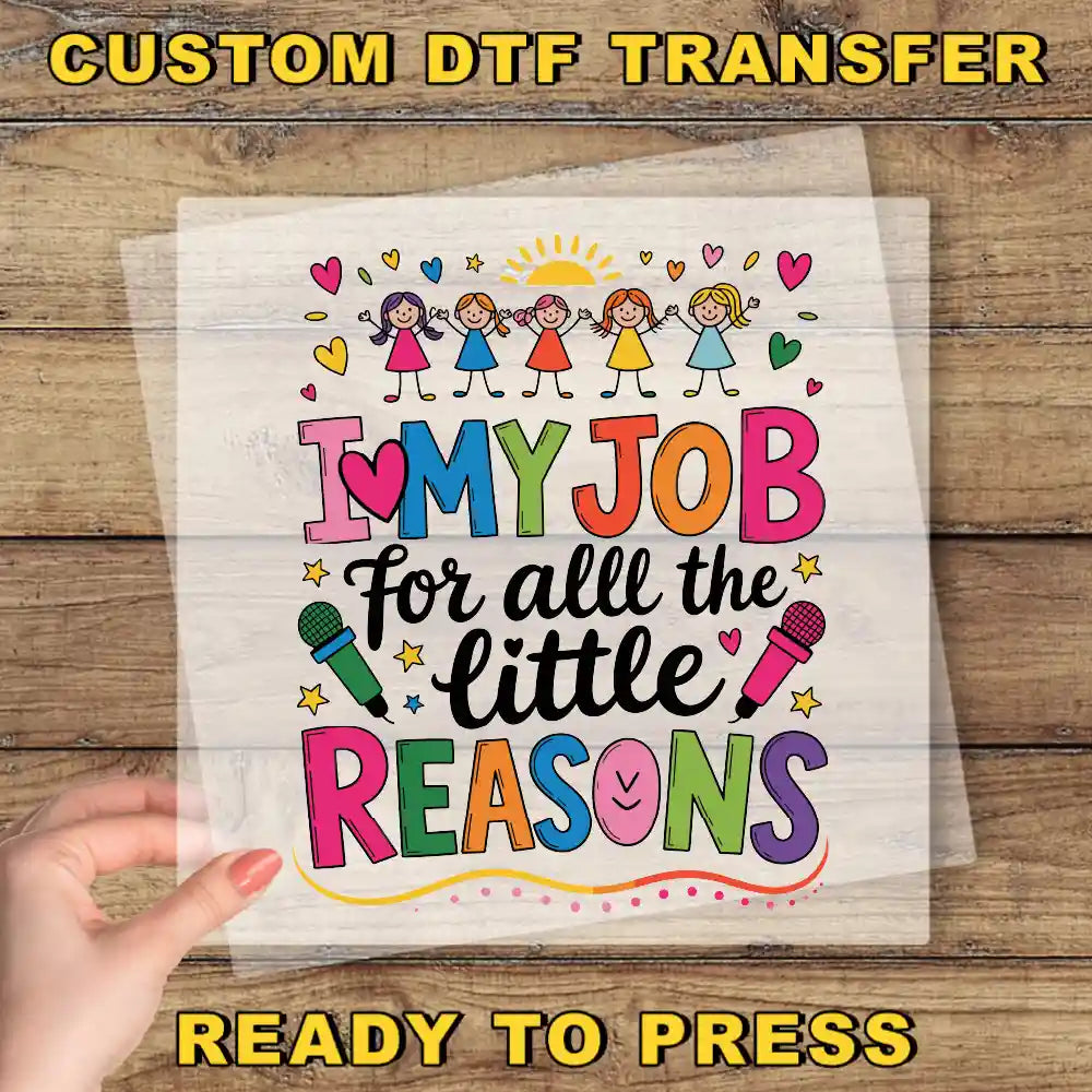 The image is a hand holding a sheet of paper with a colorful and artistic design featuring a message about loving one's job for all the little reasons.