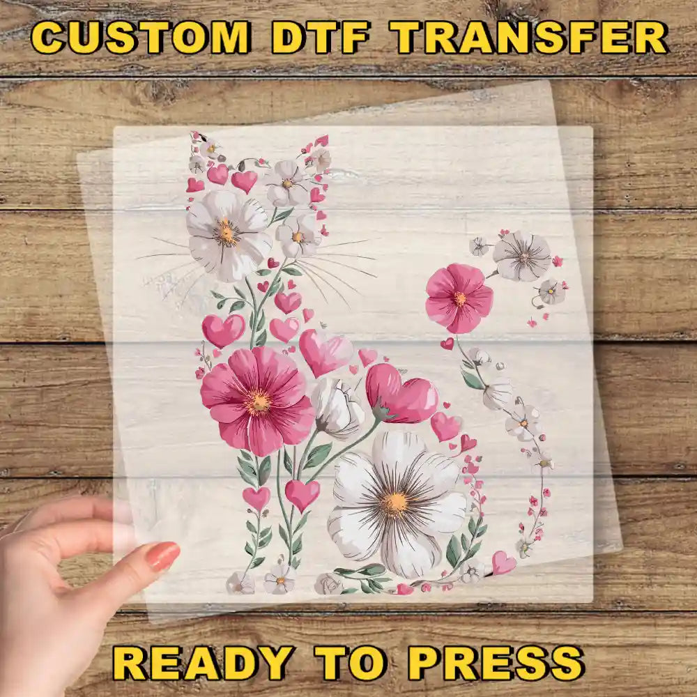 a person holding a piece of paper with flowers on it