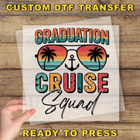a person holding up a paper with the words graduation cruise squad on it