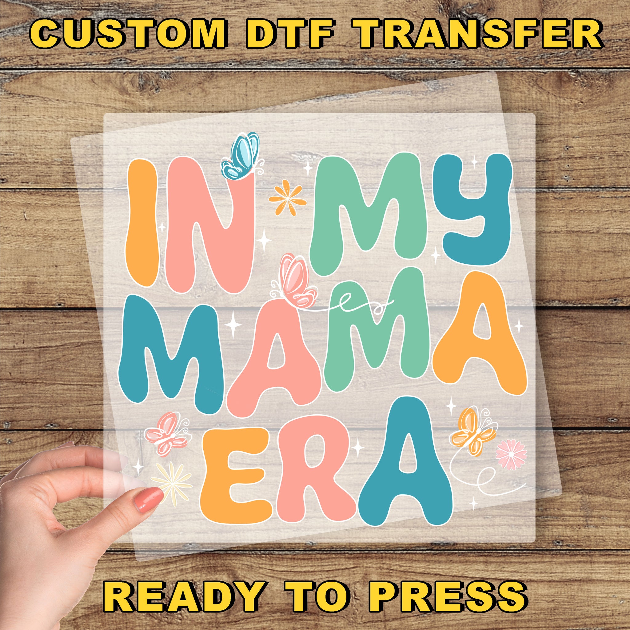 a person holding a piece of paper with the words in my mama era on it