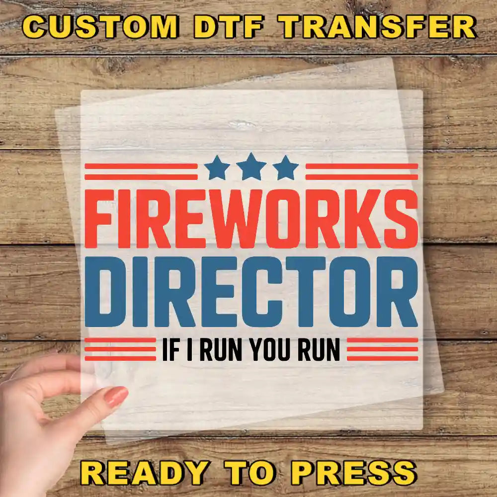 a hand holding a piece of paper that says fire works director if i run you