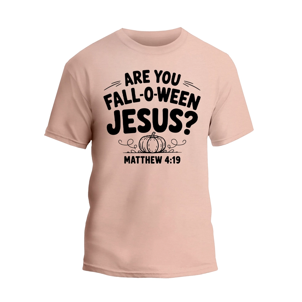 A light pink t-shirt with a graphic design featuring the text "ARE YOU FALL-O-WEEN JESUS?" along with a pumpkin and the text "MATTHEW 4:19" below it.