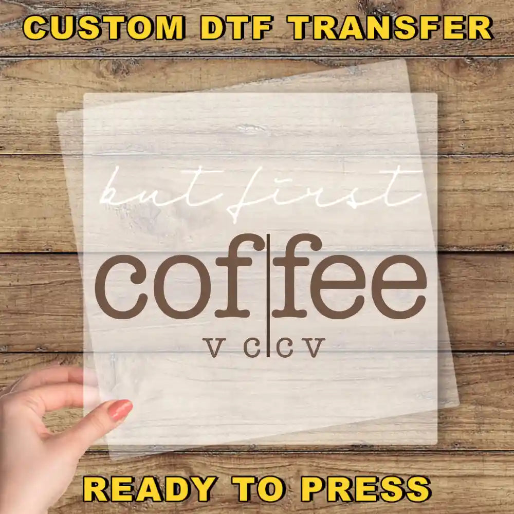 a person holding a piece of paper with the words coffee on it